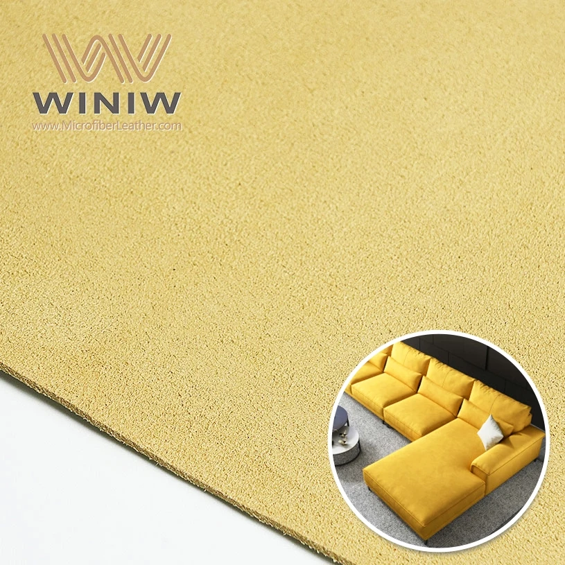 Yellow microfiber suede sample shown with sofa upholstery application Yellow microfiber suede sample shown with sofa upholstery application